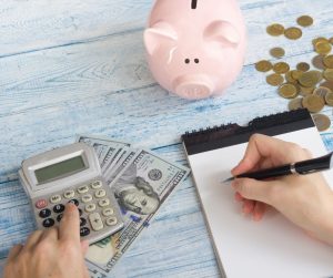 Save money piggybank calculator and notepad